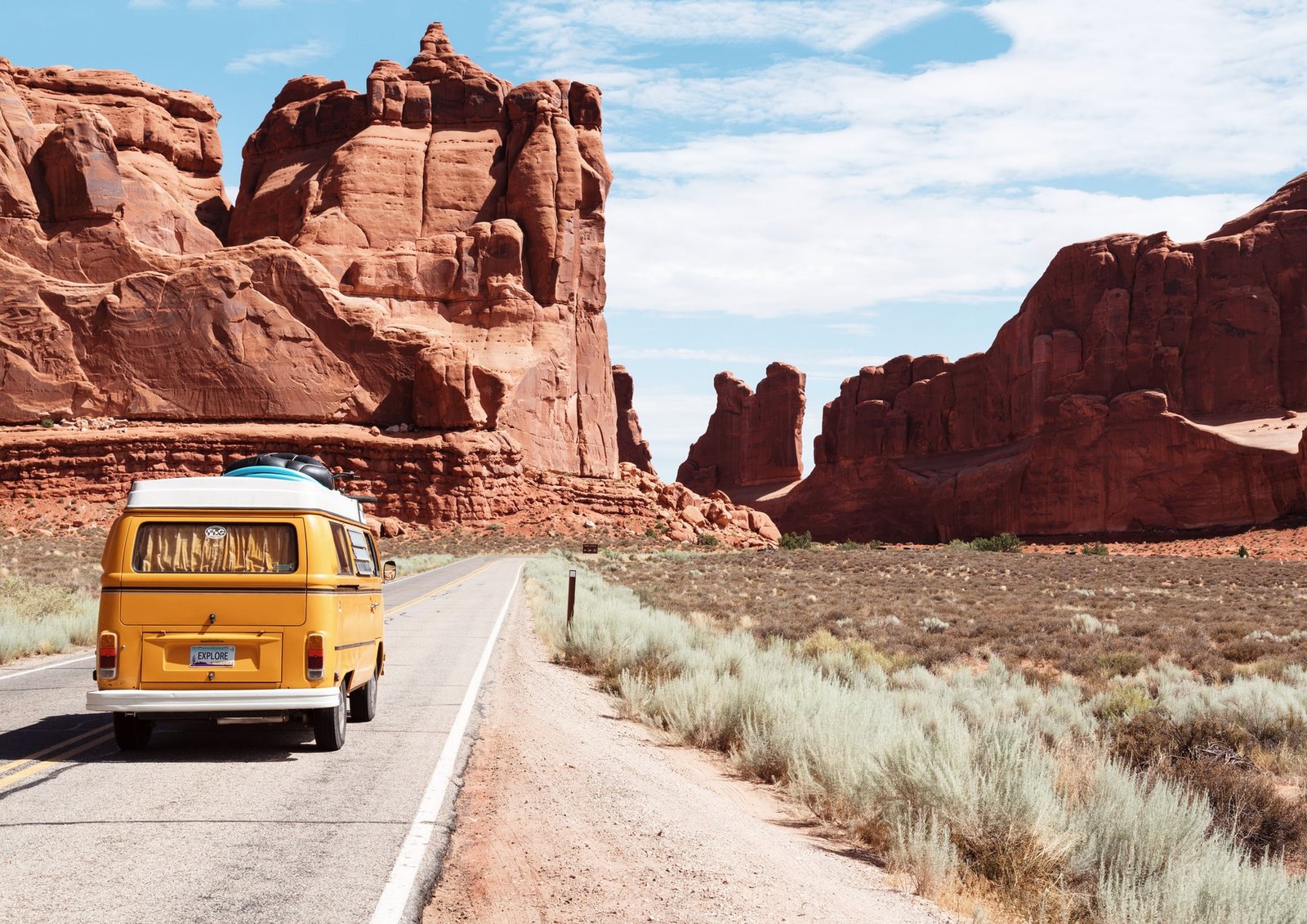 Integer id nisi neque cras et justo Yellow van on road